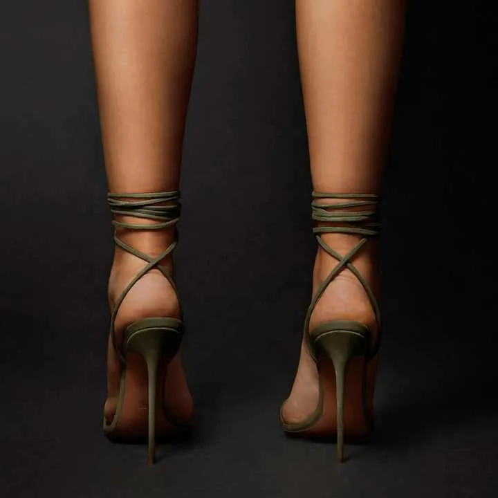 صندل كعب عالٍ برباط من قماشHigh heel sandal with lace up fabric